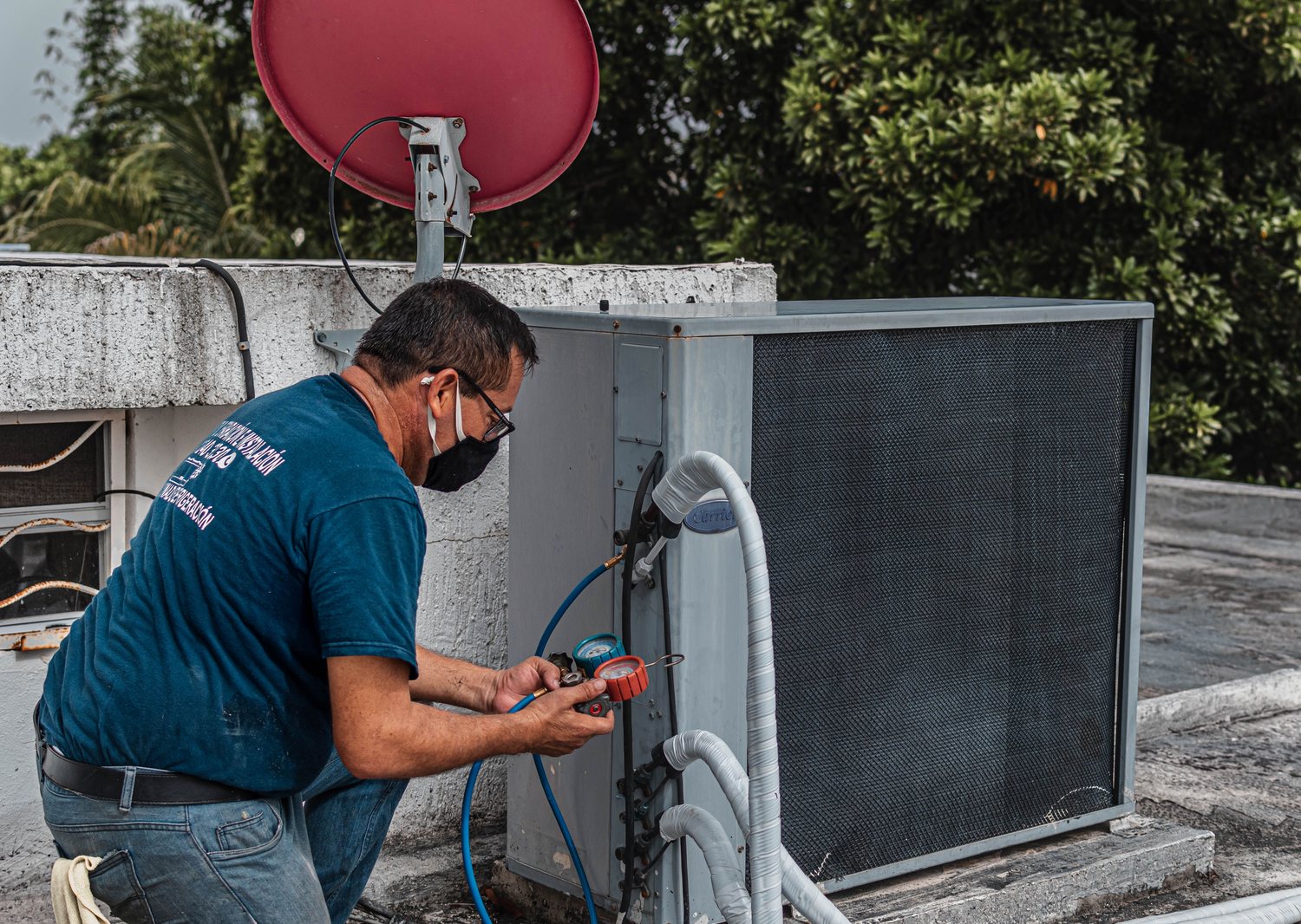 Technician working with HVAC equipment